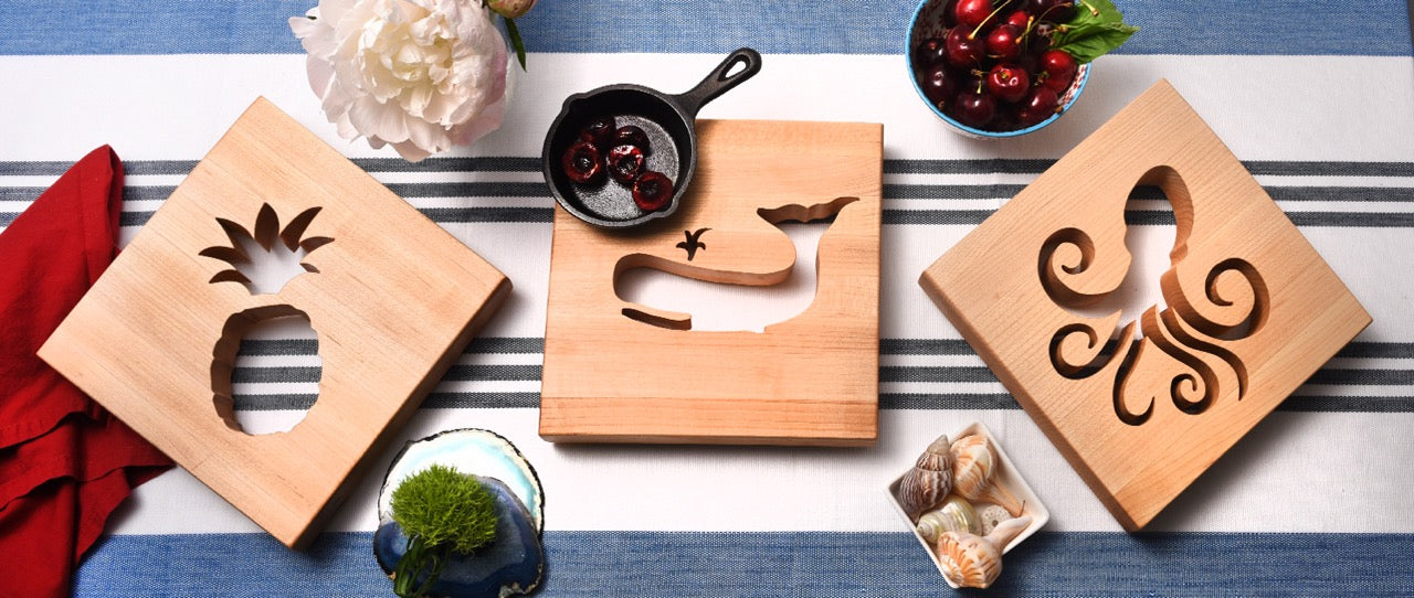 3 wooden trivets