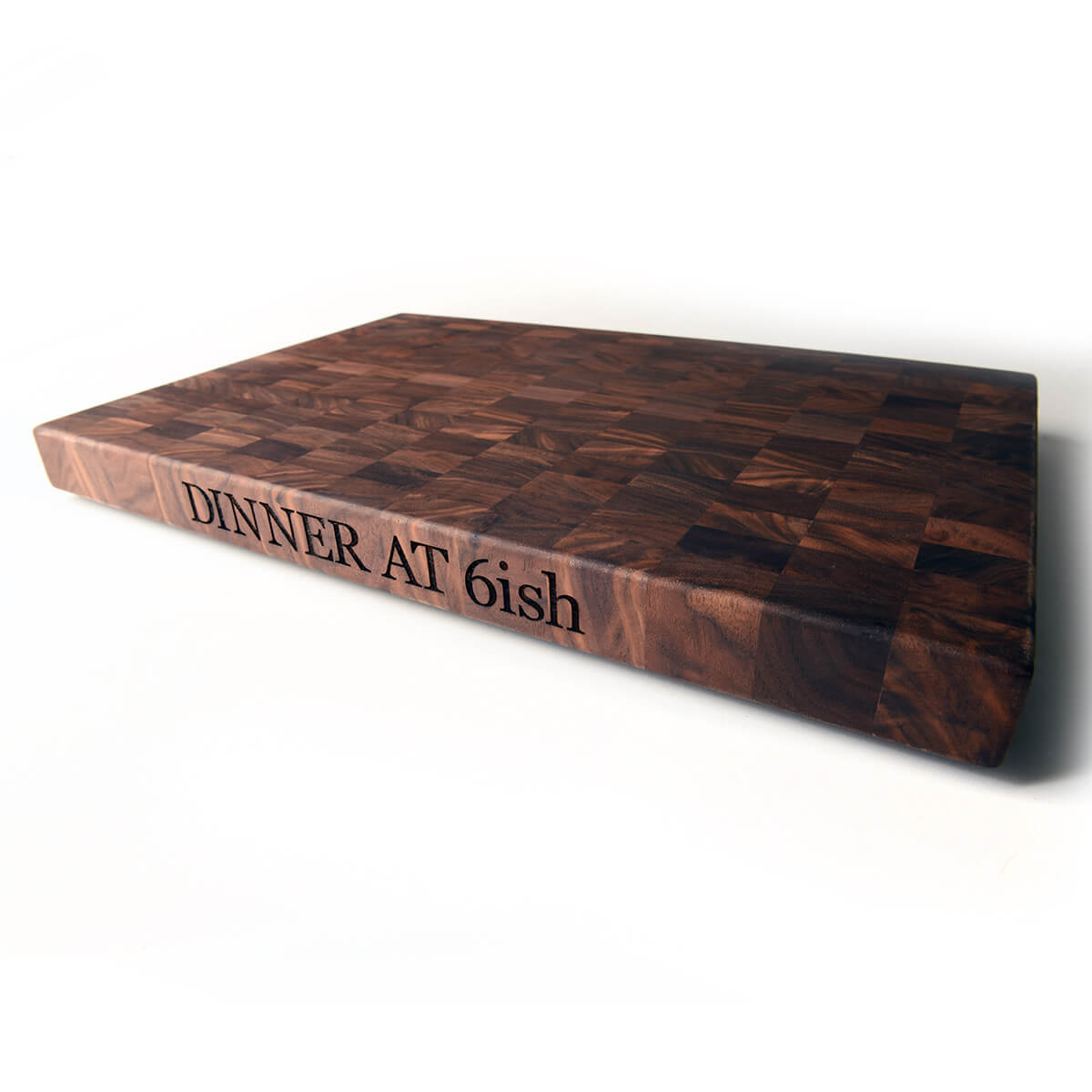 cutting radishes on cutting board made from end grain walnut