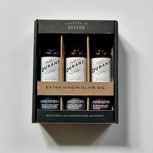 Packaging of 3 Durant Extra Virgin Olive Oil bottles on a light gray background