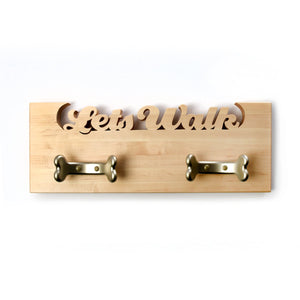 Lets Walk cut out of a wood wall holder for pet leashes