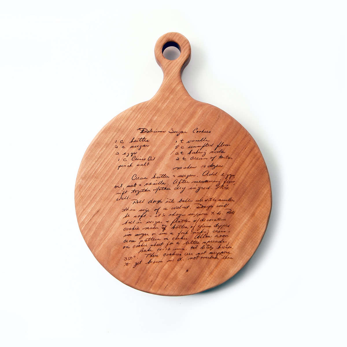 cutting board with a recipe, round cherry wood