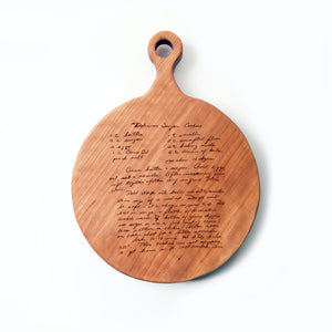 cutting board with a recipe, round cherry wood
