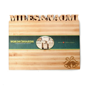 cutting board with couple names cut out, laser engraved wedding bells on maple wood