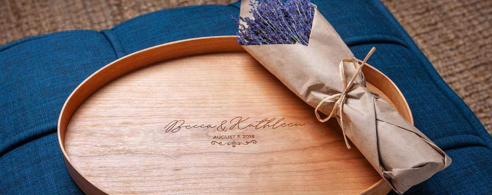 Wood Serving Tray with lavender, on blue ottoman