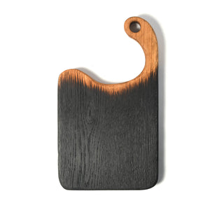 charred wood board with handle