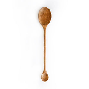 Wooden spoon on a white background