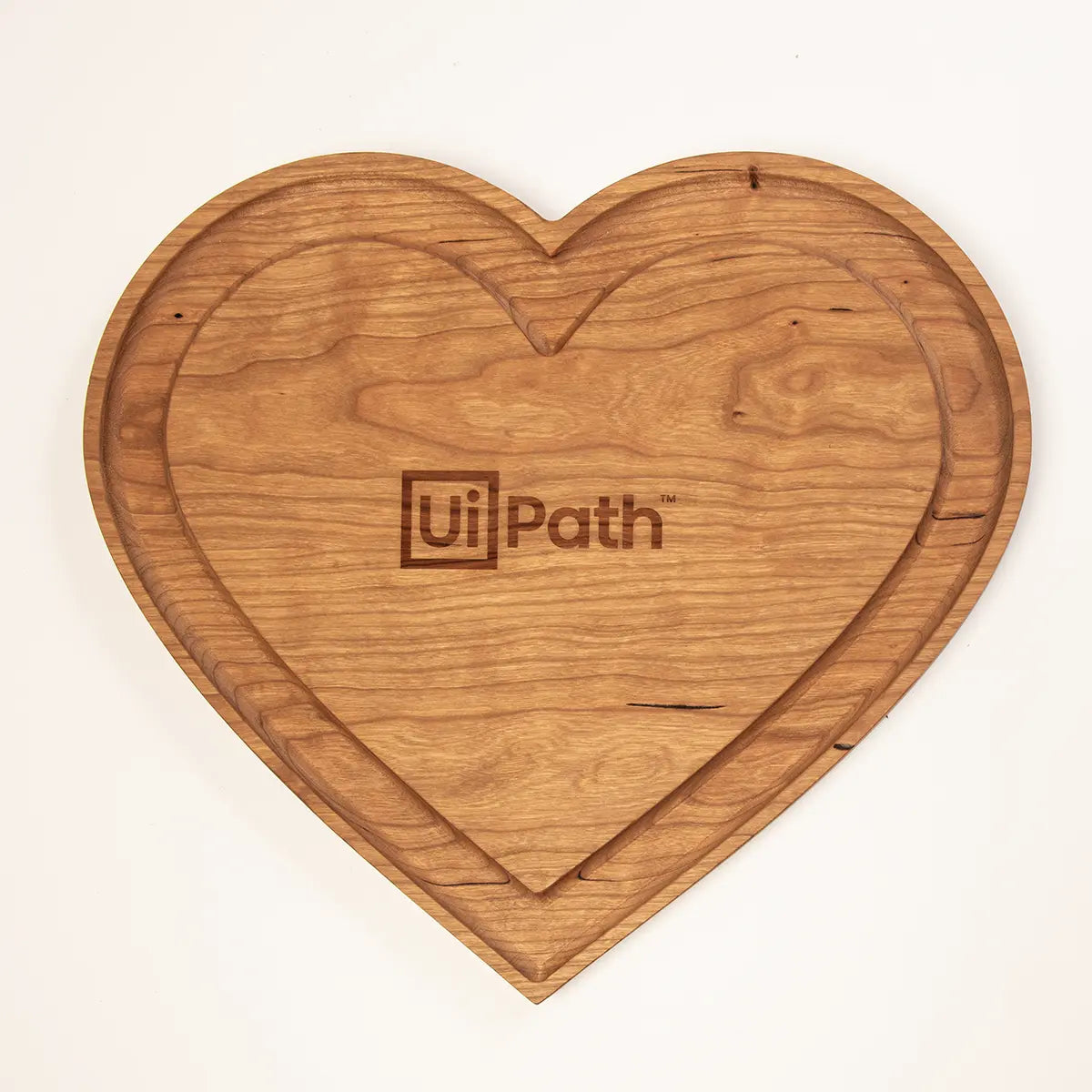 custom heart shaped board with logo laser engraved in center