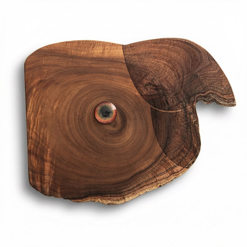 wood art that looks like a parrot, white background