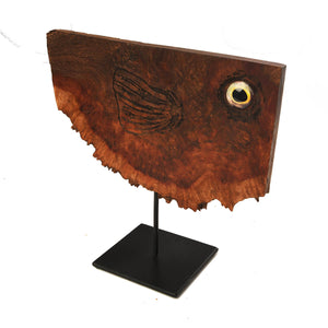 pufferfish shape in wood on metal stand