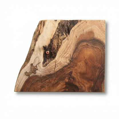 live edge walnut wood art, the wood grain forms what looks like a dragon head and a knight on horse laser engraved, on white background