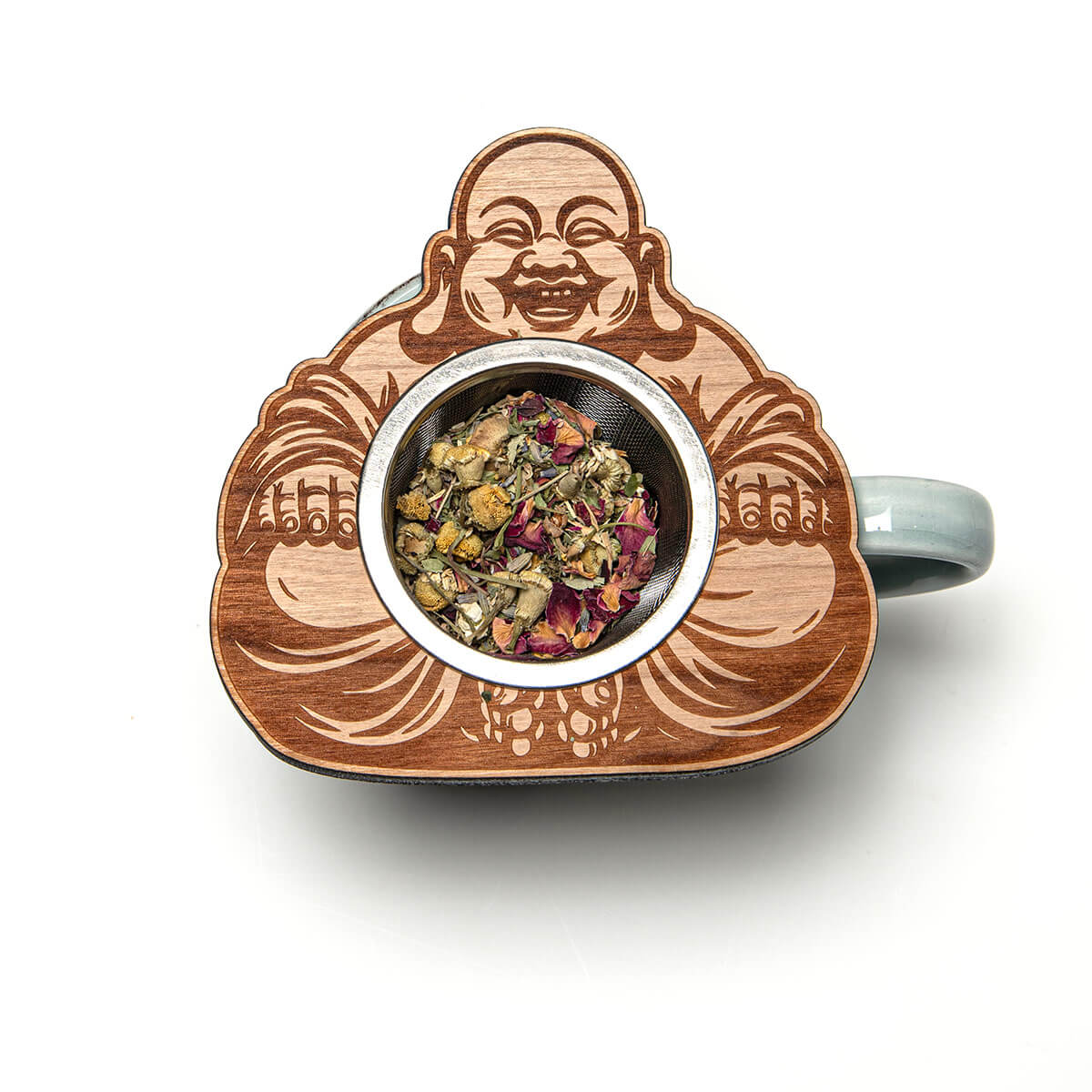 Tea infuser shaped like a smiling Buddha figure with tea leaves inside on a white background