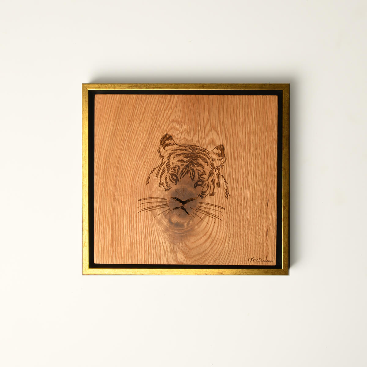 wood art framed and laser engraved to look like a tiger, white background