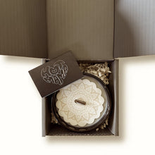 woodwick candle, black matchbook shown in grey box, white background