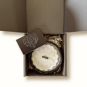 woodwick candle, black matchbook shown in grey box, white background