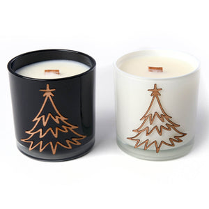 christmas tree decoration on white and black woodwick candle gift set