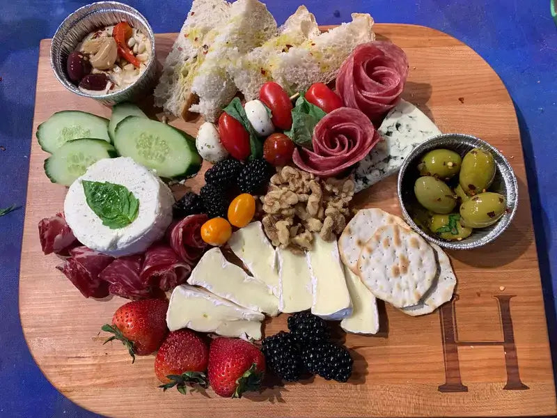 leaf shaped cherry wood  cutting board design, serving charcuterie