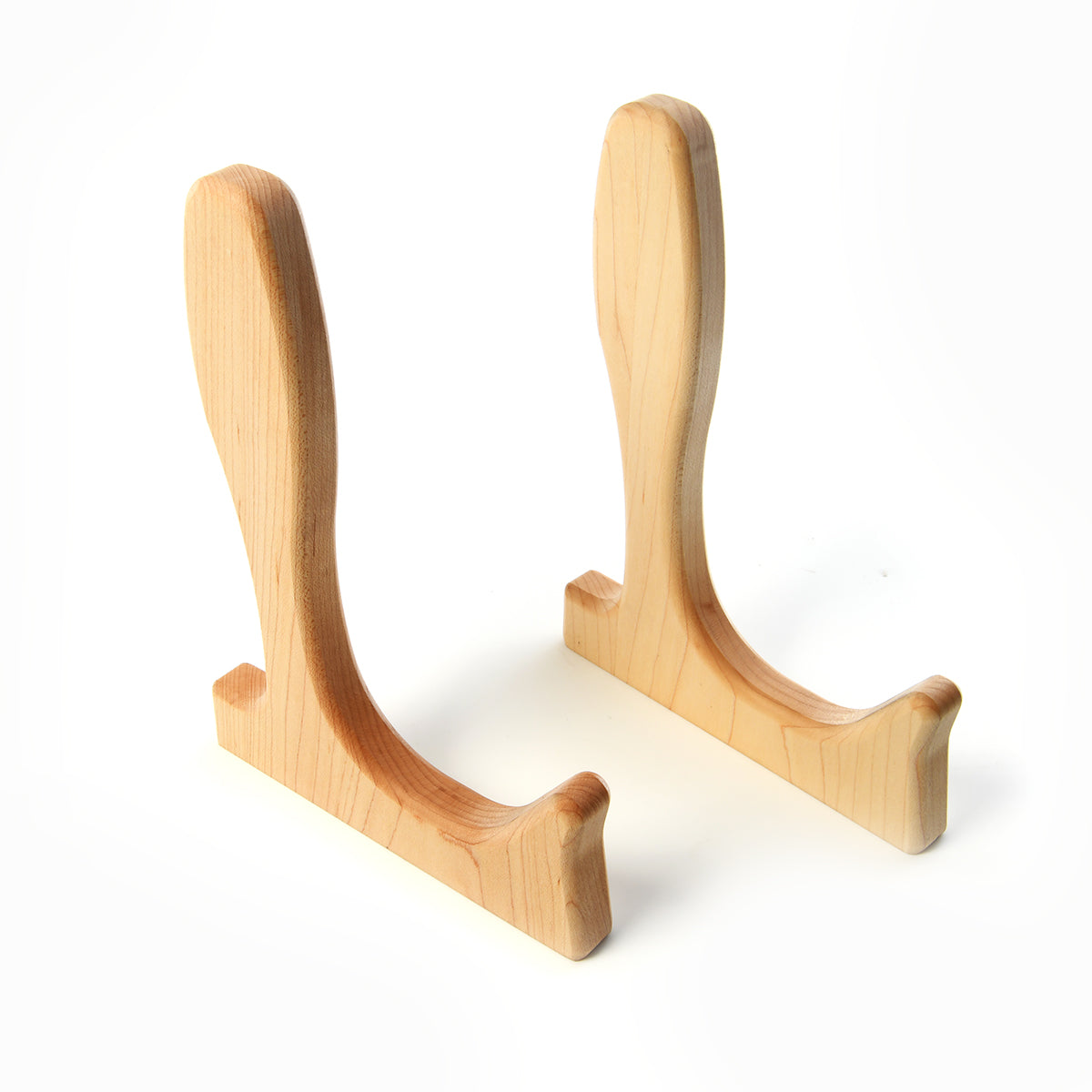 cutting board holder, shown holding a cutting board, maple wood