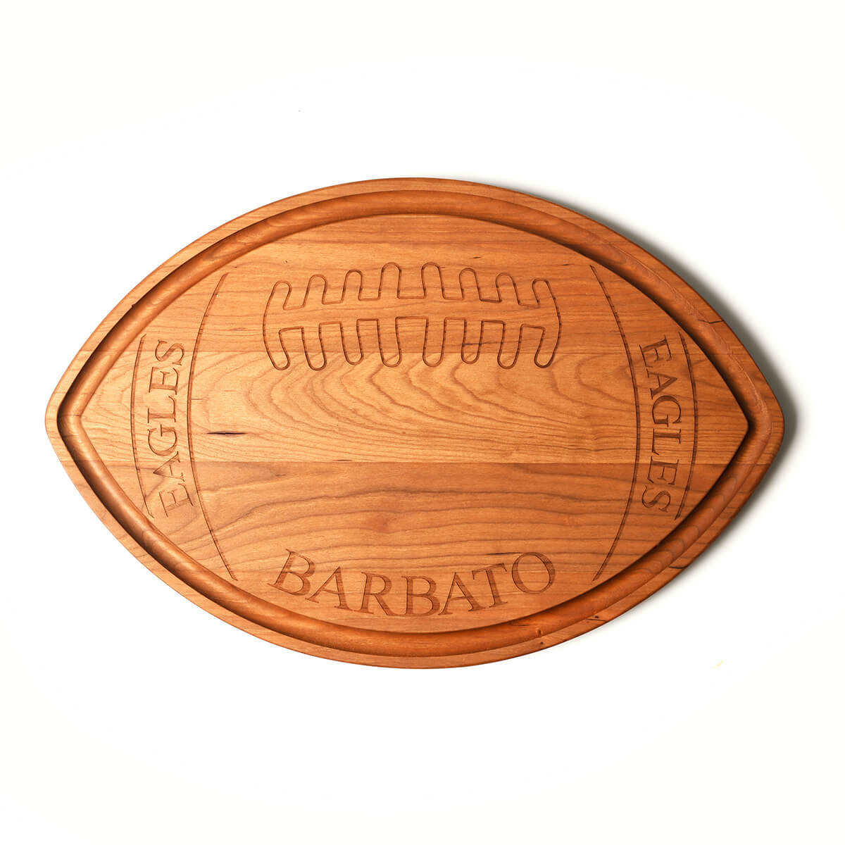 wooden football shaped serving board, Personalized with Eagles and last name