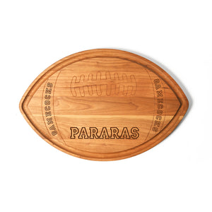 custom team name on a football shaped cutting board