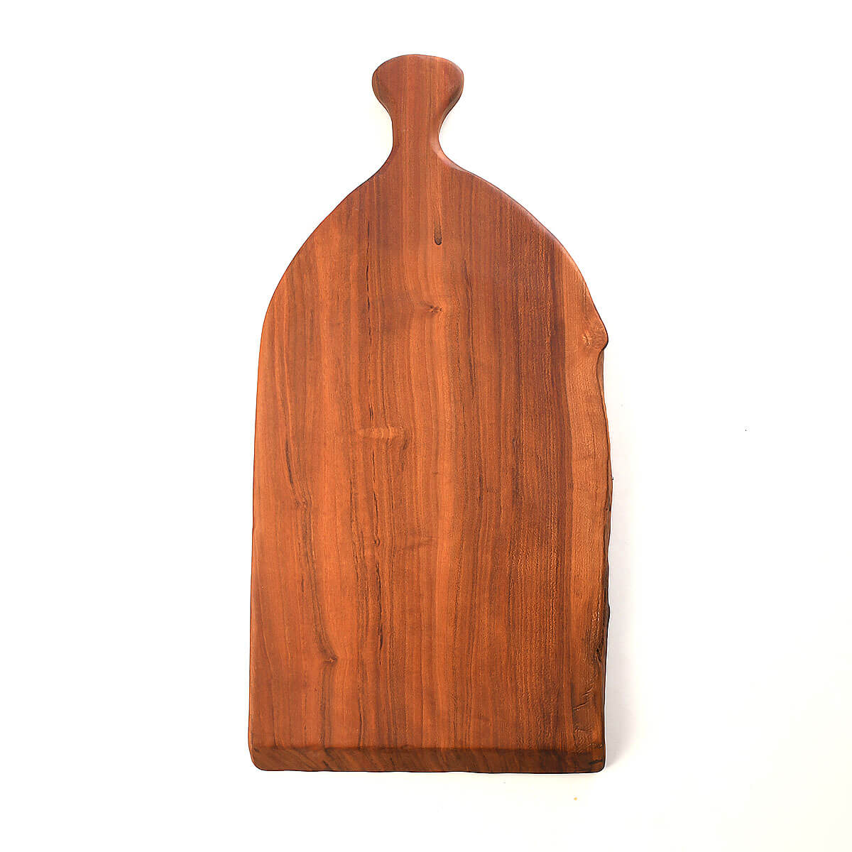 live edge cutting board with handle in the middle, cherry wood