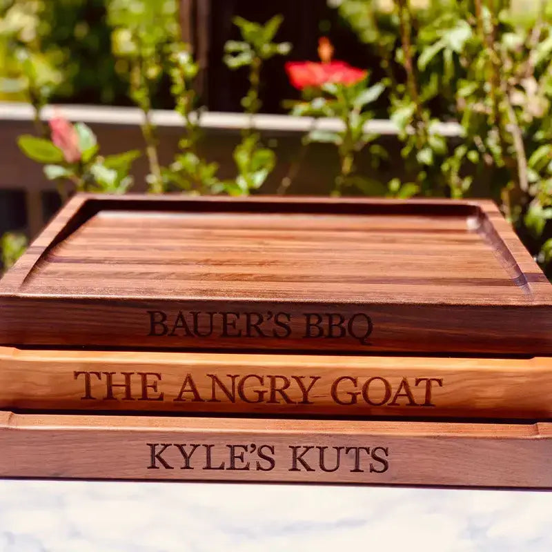 stacked custom meat boards in cherry and walnut wood