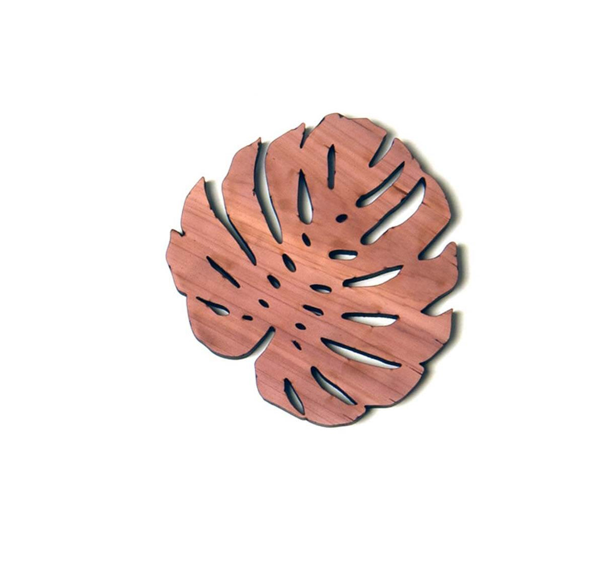 Wooden leaf-shaped coaster on a white background