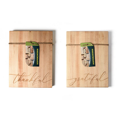 1 wooden cutting board in maple wood with 'thankful' laser engraved on one side and 'grateful' on the other side  on a white background