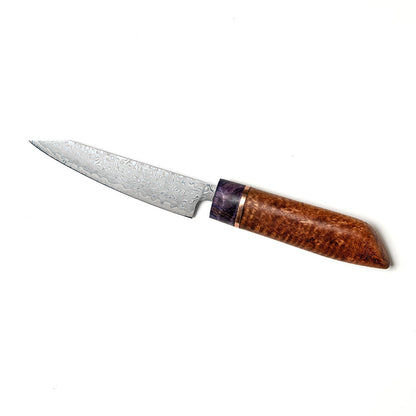 brown and purple wood handle on stainless steel petty knife, white background