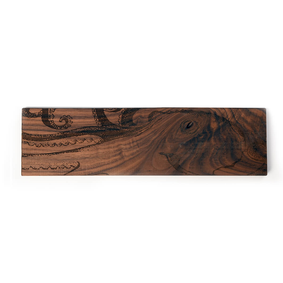 octopus engraved on walnut, unframed
