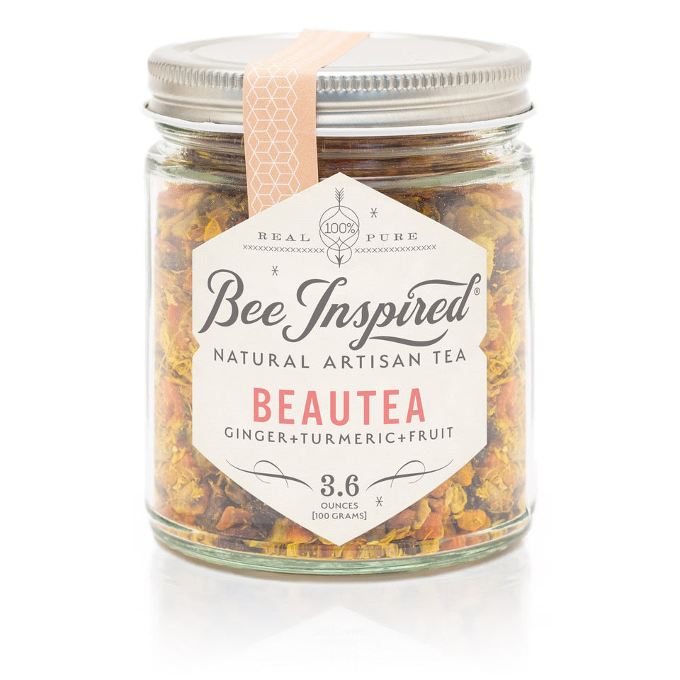 Beautea loose tea in glass jar, white background