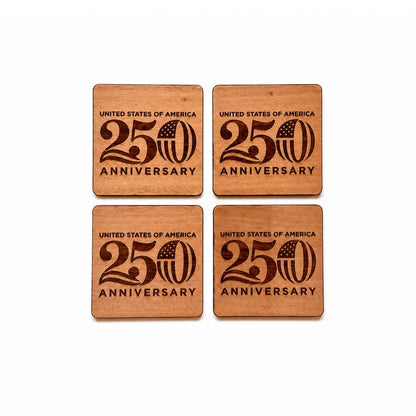 Four wooden coasters with 'United States of America 250th Anniversary' engraving on a white background.