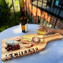 wine bottle shaped cheese board with charcuterie