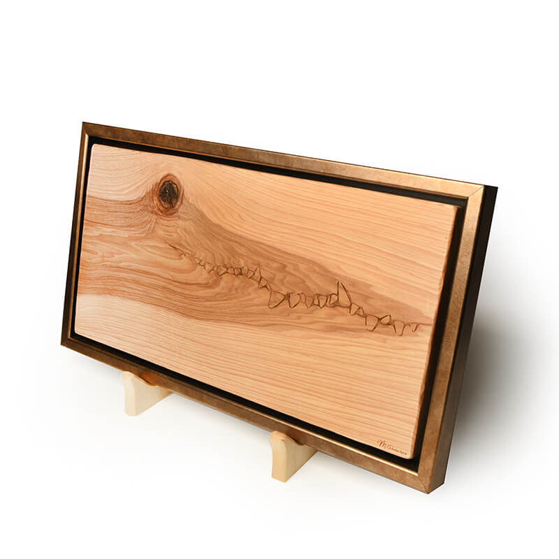 wood cutting board holder, shown with framed art