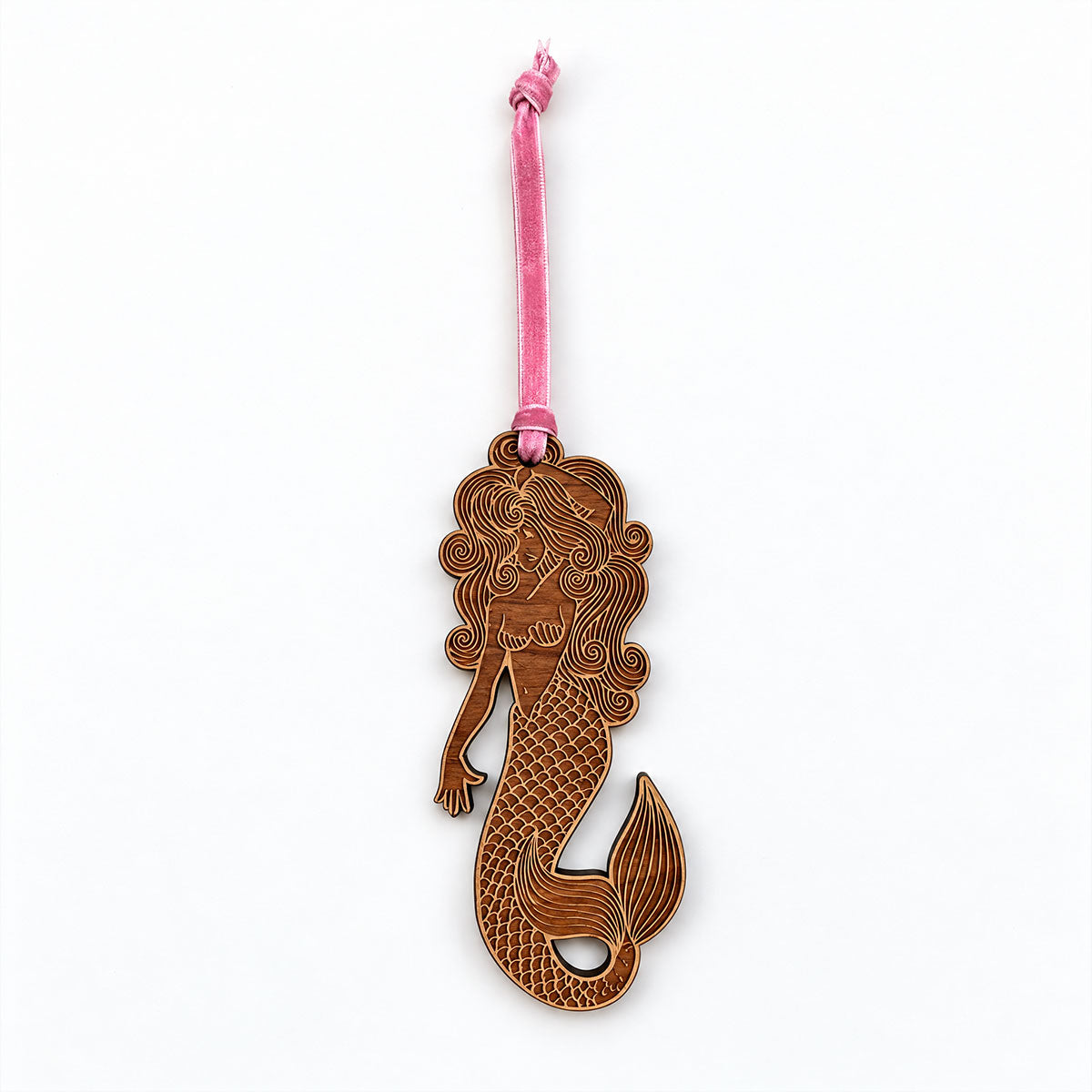 mermaid wooden holiday ornament with velvet pink tie, white background