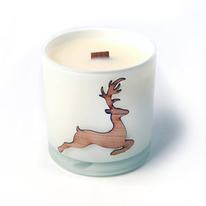white woodwick candle with reindeer wood sticker, soy