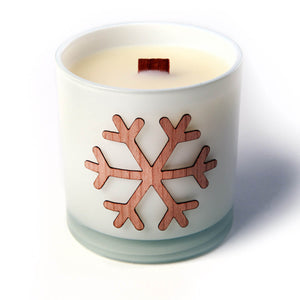 white woodwick candle gift with snowflake decoration