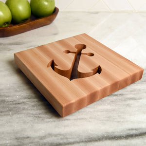 wooden trivet with anchor shape cut out, maple wood