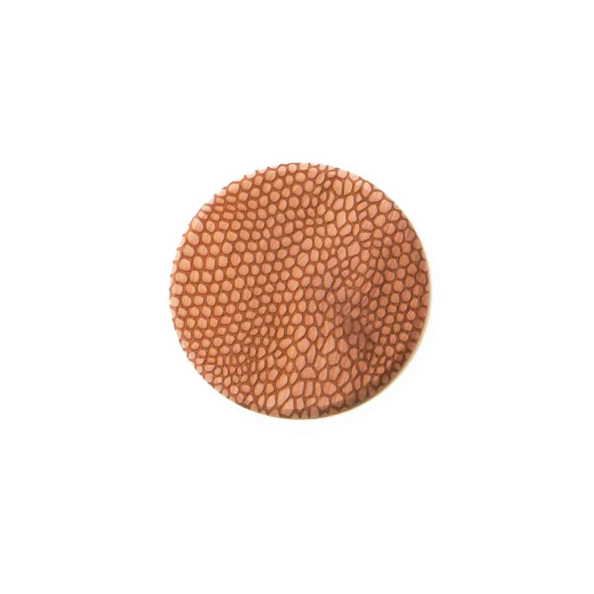 Cedar coaster with snake skin pattern all over