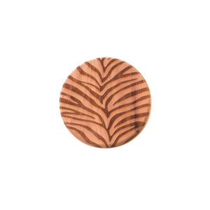 cedar coaster with zebra pattern printed all over