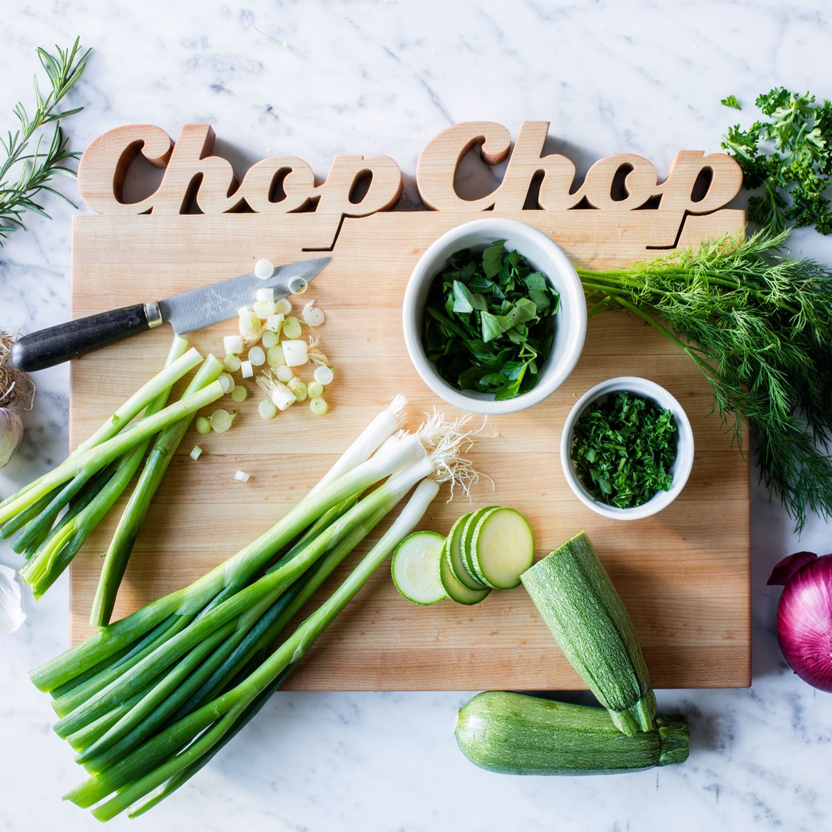 Cool cutting boards - has the words Chop Chop cut out on top, maple wood