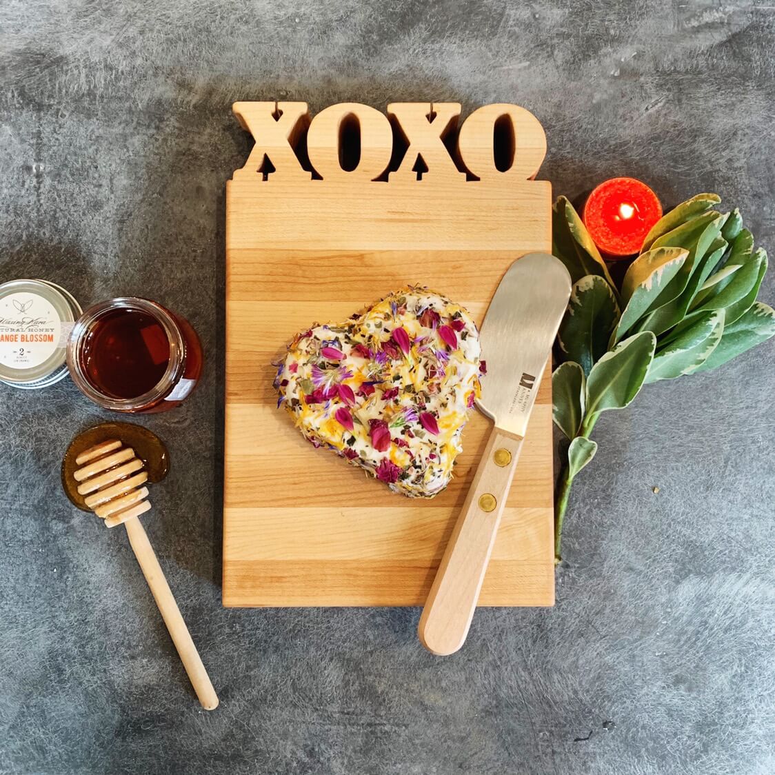 XOXO Cutting Board with food on it