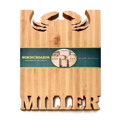 crab cutting board with names carved out of maple wood