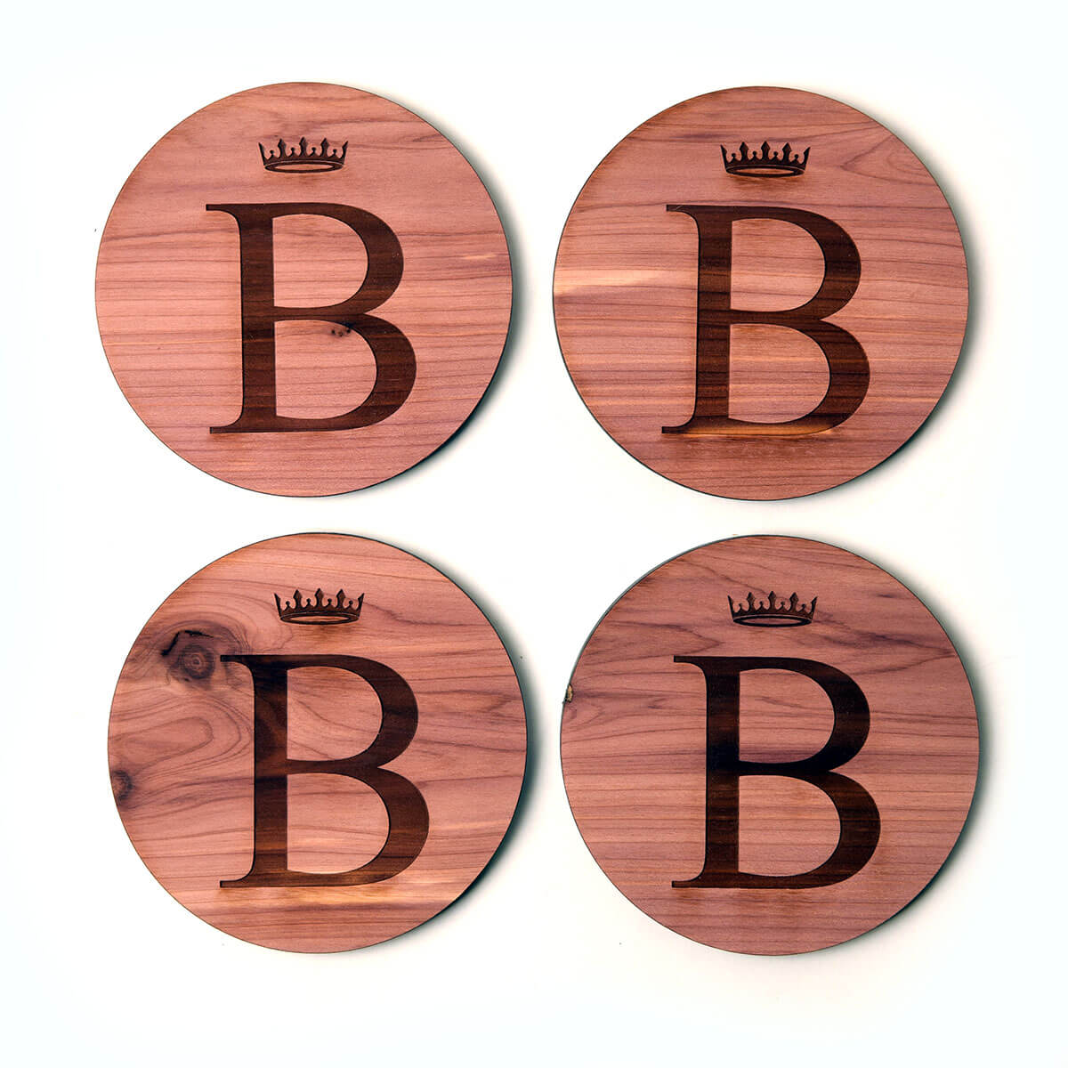 Set of 4 personalized coasters, starburst and initial T engraved on cedar wood
