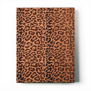 LEOPARD PRINT laser engraved on a wood cutting board
