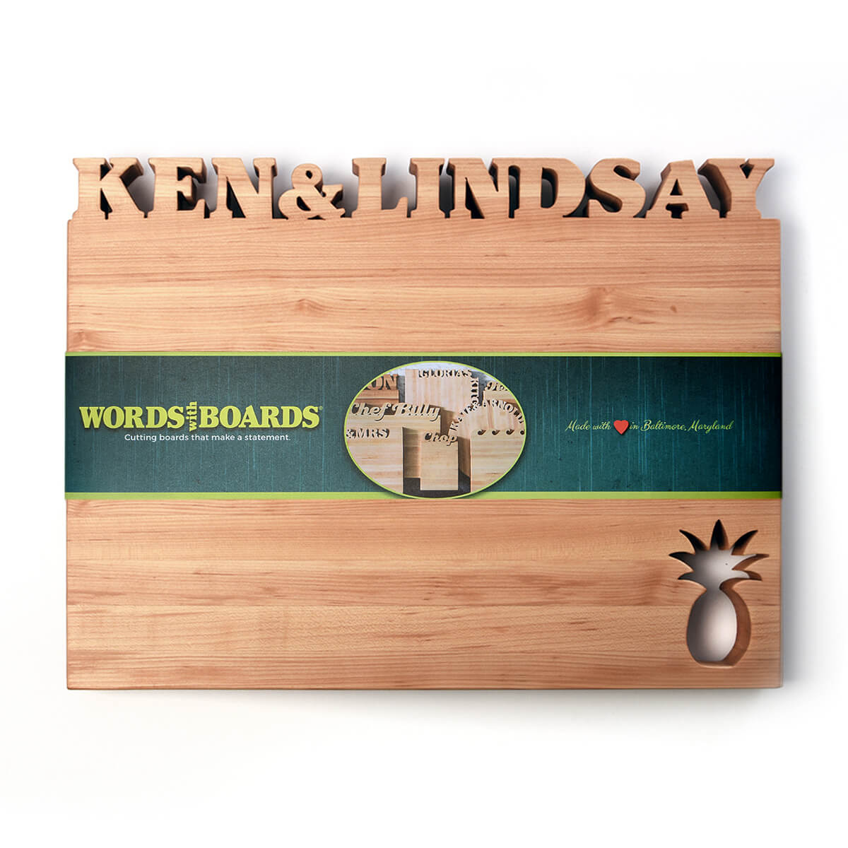 Pineapple cutting board in cherry wood, the words beach house on top