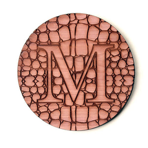 cedar coaster, personalized with letter M and alligator pattern