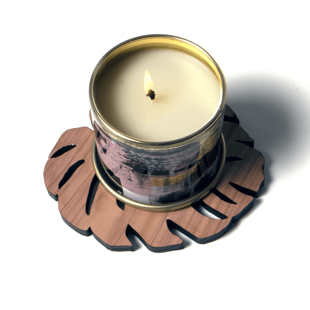 monstera leaf coaster with candle on top