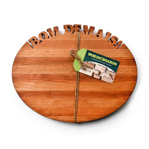 Oval personalized cutting board with Bom Desmais! cut out of top 