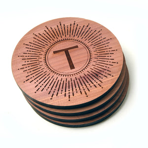 Coaster set, starburst design with single initial, cedar wood