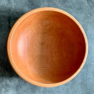 Wooden bowl, cherry wood, top view